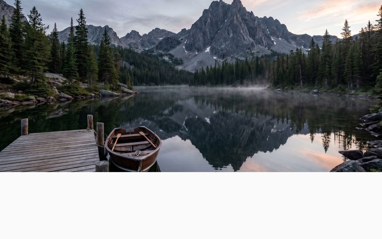 A dawn mountain lake pulls cool slate, pine green, and pale peak pink into a print-ready palette.